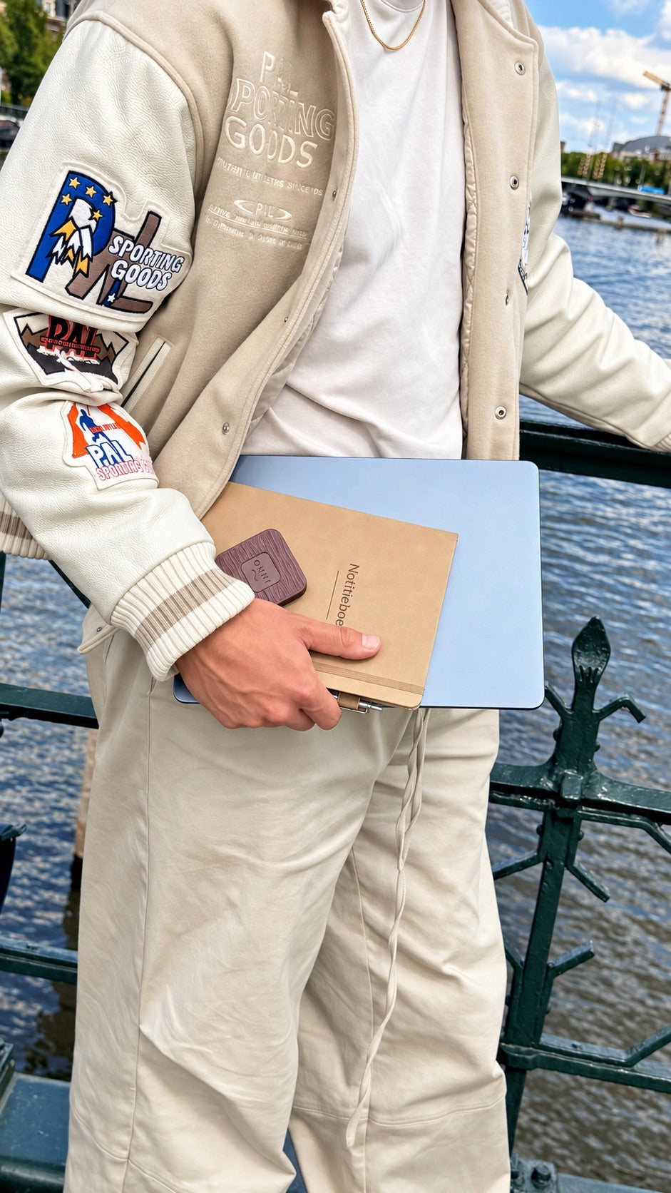 A leather notebook with the Kiuas tucked against it
